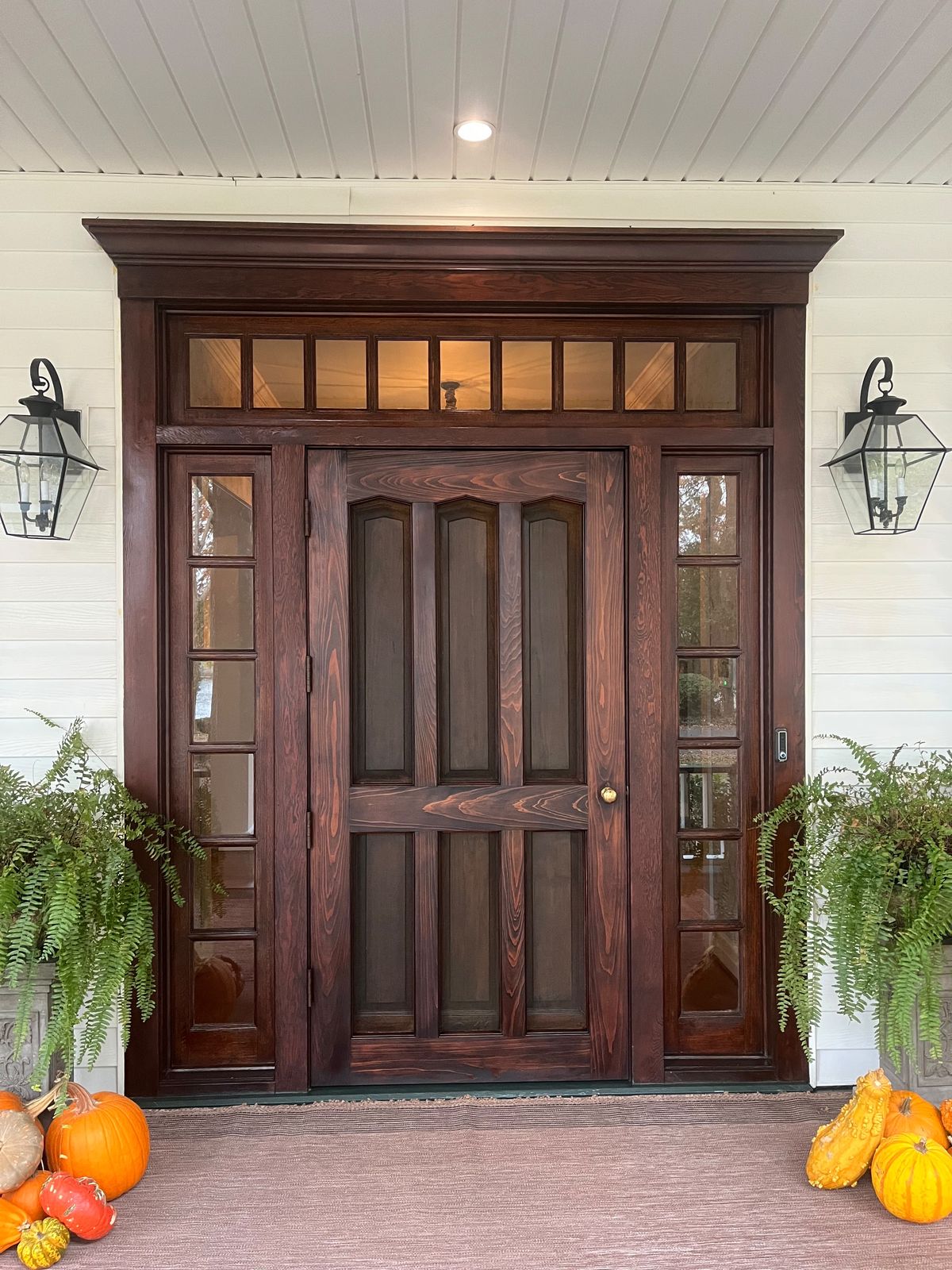 Mahogany front door with sidelights and transom