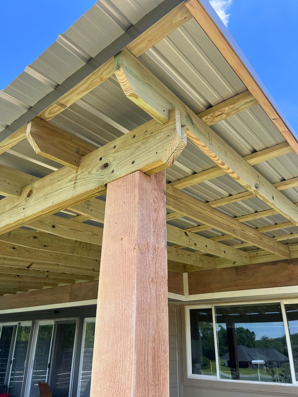 Timber post and metal-roof patio cover