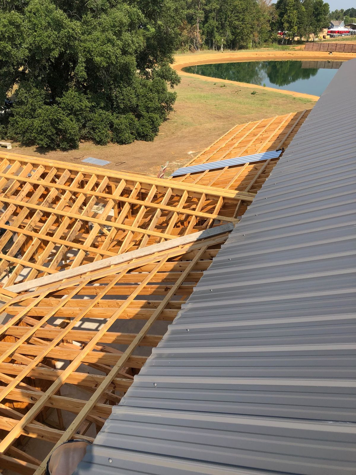 Metal roof going on over new trusses