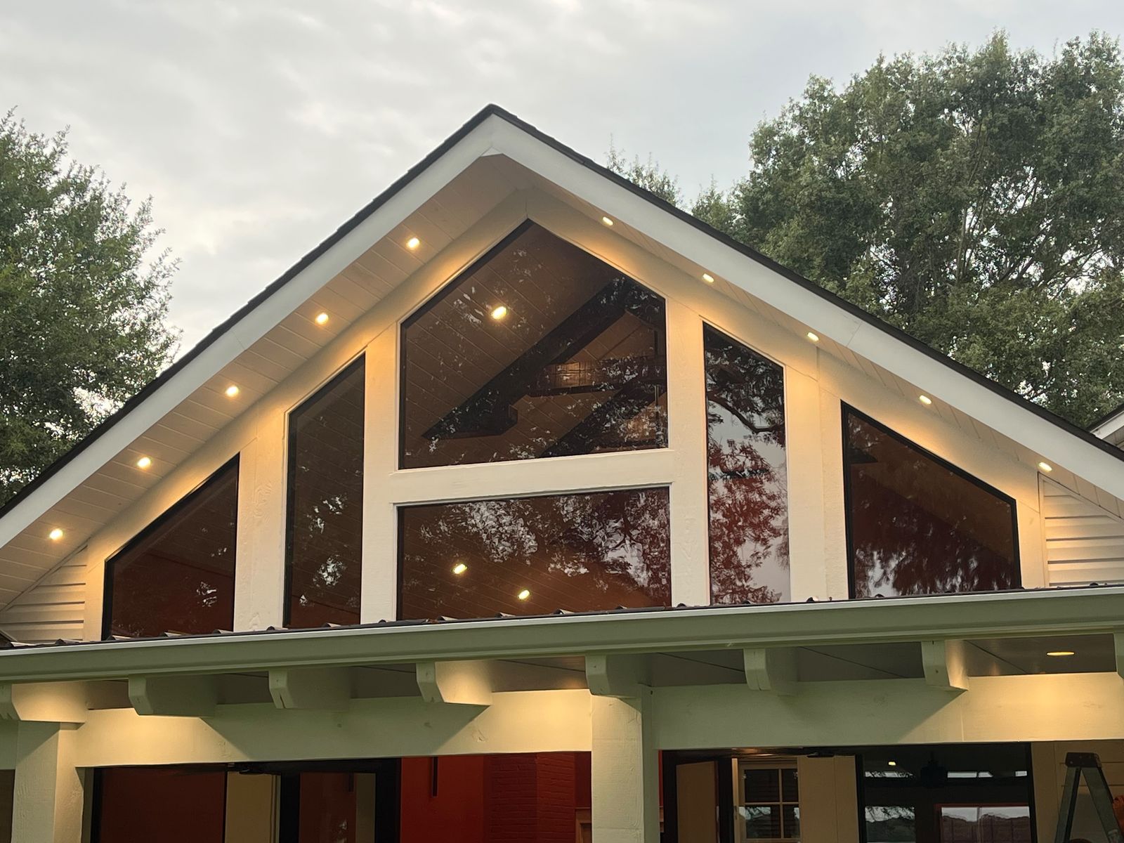 Gable window wall with soffit lighting