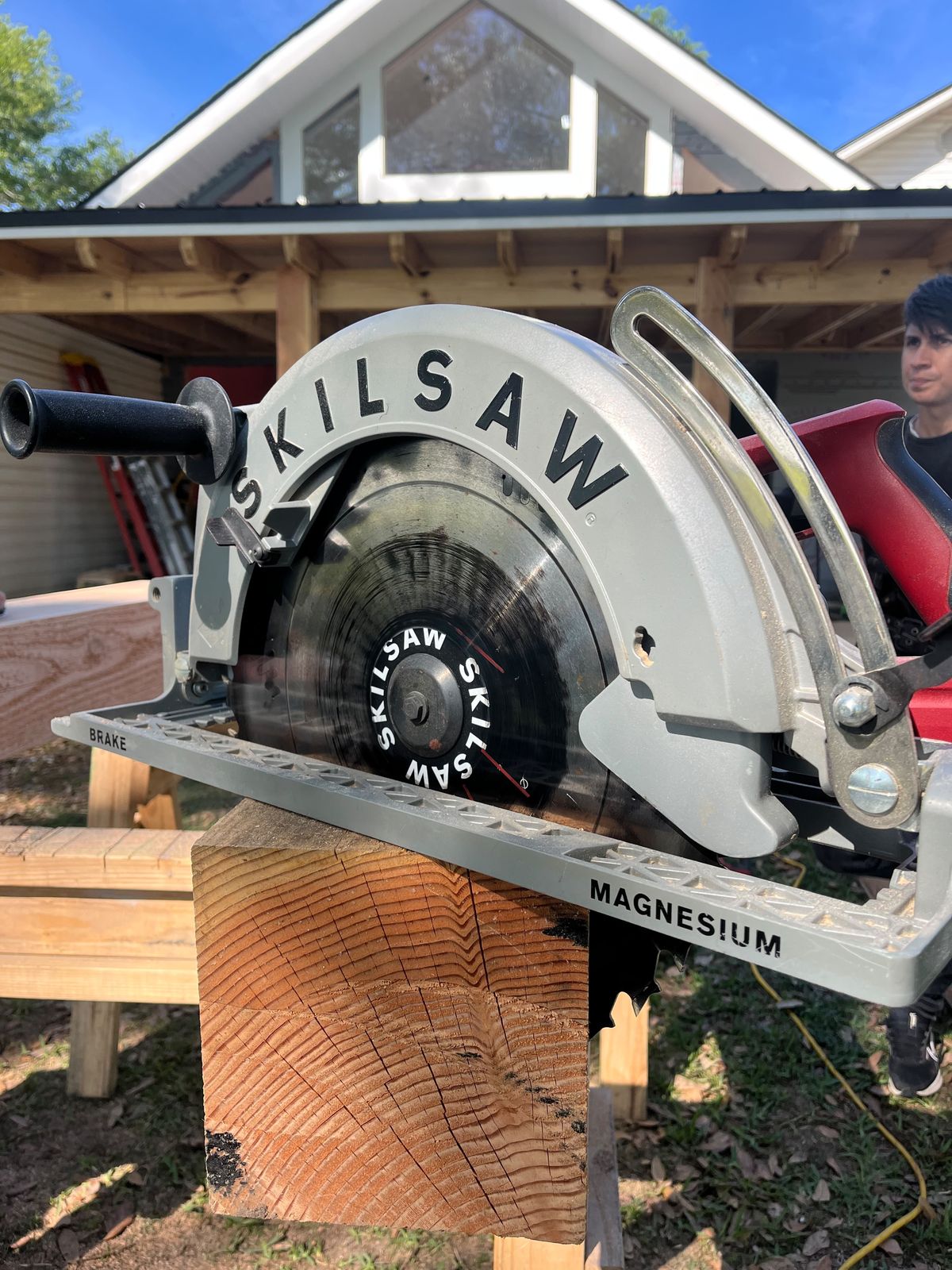 Cutting a beam with the worm-drive saw